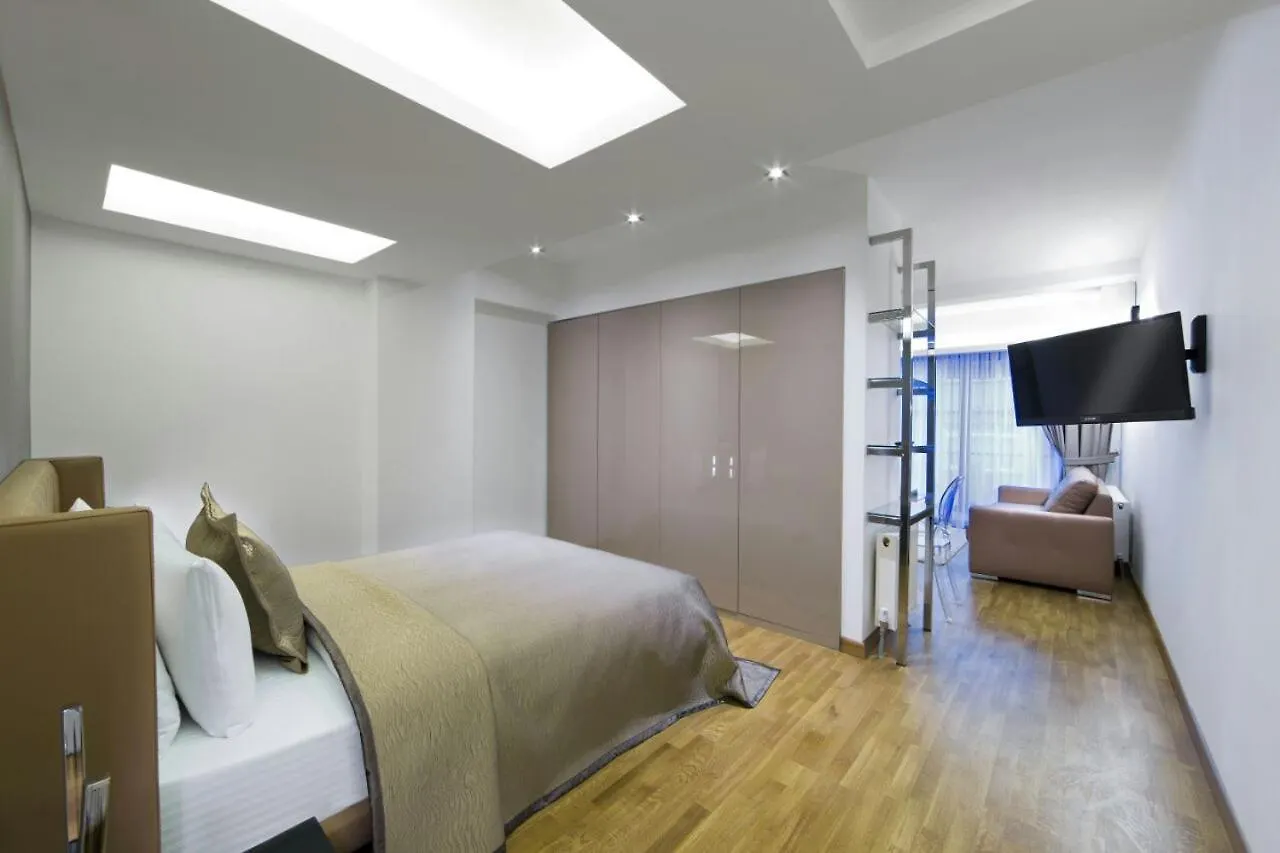 Hotell The Place Suit & Apartments